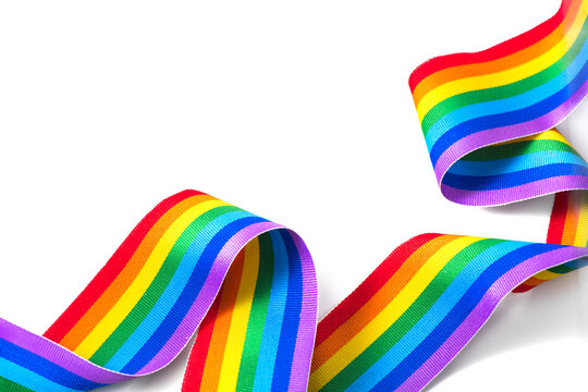 Colorful rainbow ribbon border design. LGBT colourful corner design, isolated on white background. Gay pride design. Curly, waving ribbon or banner with flag of LGBTQ pride border