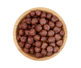 Hazelnuts in a wooden bowl isolated.