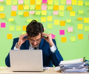 Businessman having trouble with his priorities