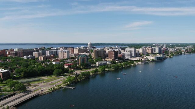 Drone Over Lake Monona Along Shoreline in Summer in Madison Wisconsin (Push In & Lower Altitude)