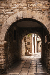 Fototapeta na wymiar Arch in ancient Diocletian's Palace in old town of Split, Croatia