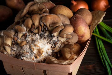 Raw oyster mushrooms, potatoes, onions, spring onion