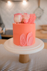 pink cake with roses and petals