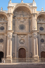 Fototapeta premium Vertical picture of Granada old town and the Cathedral. It's a sunny day in Pasiegas Square, Granada, Andalusia, Spain