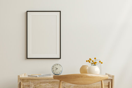 Mockup frame on work table in living room interior on empty white wall background.