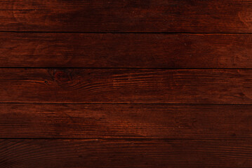Obraz na płótnie Canvas Vintage brown wood background texture with knots and nail holes. Old painted wood wall. Wooden dark horizontal boards