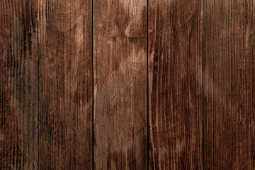 Vintage brown wood background texture with knots and nail holes. Old painted wood wall. Wooden dark horizontal boards