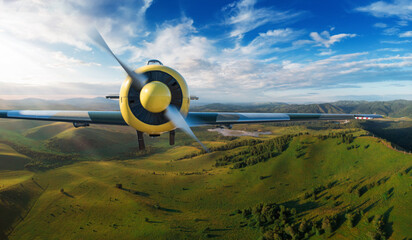 Small aircraft flying above in the blue sunset sky