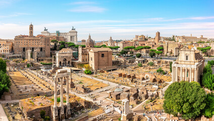 Fototapeta na wymiar View on the Roman Forum ruins, temples, ancient houses at sunny day, Rome, Italy