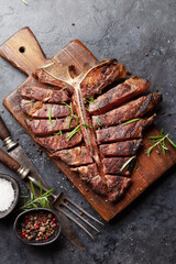Grilled porterhouse beef steak. Sliced T-bone