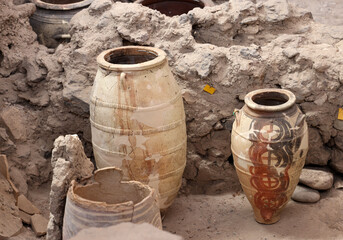  Recovered ancient pottery in prehistoric town of Akrotiri, excavation site of a Minoan Bronze Age 