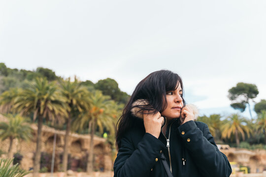 A tourist woman visiting park guell in barcelona