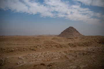 View to Userkaf pyramid from ruins near step pyramid of Djoser.  Archeological remain in the Saqqara necropolis, Egypt