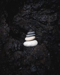 zen stones on black background