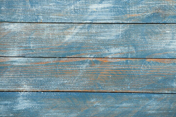 Vintage blue wood background texture with knots and nail holes. Old painted wood wall. Blue abstract background.