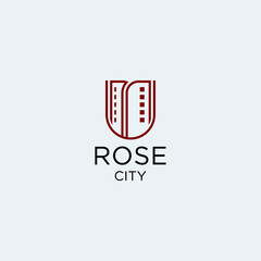 Building logo design with abstract rose flower and line graphic for real estate