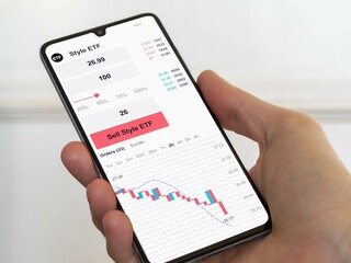 Stock exchange market chart, Stock market data on smartphone. Business analysis of an style ETF