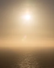 Deurstickers Beige zonsondergang over de zee