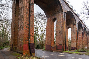 The Dollis Brook Viaduct, also known as Mill Hill Viaduct. Built in early 1860s . It carries the London northern to Mill East central from Finchley Central. It is 60 feet tall and has 13 arches. - obrazy, fototapety, plakaty