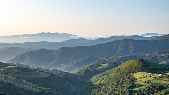 View of mountains from O Cebreriro in Pedrafita de Cebreiro in Lugo, Spain at sunrise in Galicia, Spain