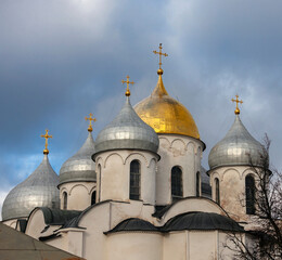 Fototapeta na wymiar Domes of the ancient church of St. Sophia against the background of the autumn sky.