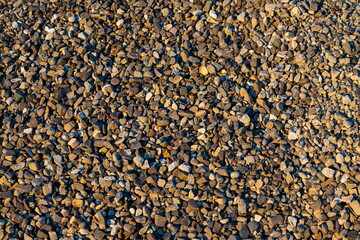 small bright pebbles and gravel as background or texture