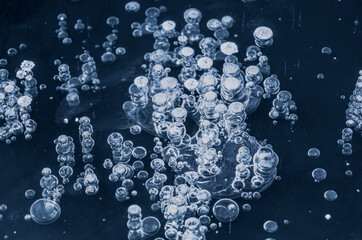 Texture pattern background white Winter, river ice air bubbles stagnant. drawing on ice frost formed