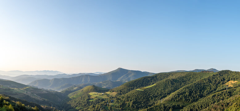 Panoramic view of mountains at sunrise from O Cebreriro in Pedrafita de Cebreiro in Lugo, Spain at sunrise in Galicia