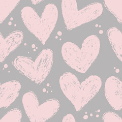 Seamless pattern with hearts in pink and gray tones. The pastel background is painted with a dry brush.