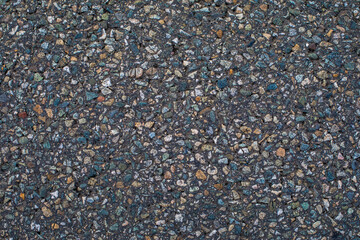 Texture of asphalt from small stones. Background for the desktop.