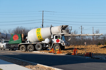 Concrete mixer truck pouring liquid concrete