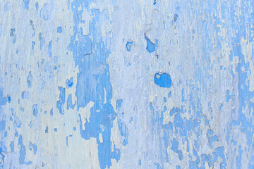 Grunge wall colored blue background texture in rainbow style.