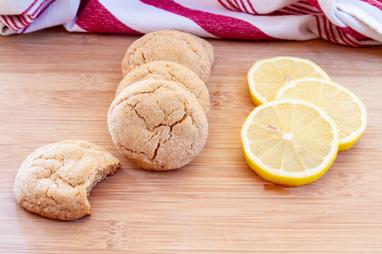 Delicious lemon sugar cookies with crinkled tops; display of home made lemon cookies