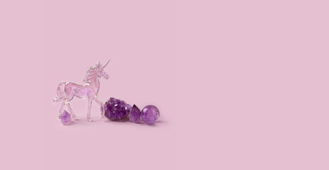 amethyst minerals set and crystal unicorn on pink background. Magic gemstones for Crystal Ritual....
