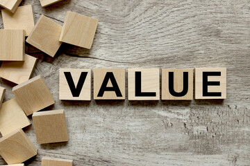 Values concept, text on wooden blocks on a wooden background