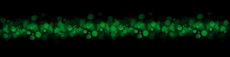 Dunkler grüner Hintergrund mit Lichtpunkten und Lichtreflexen