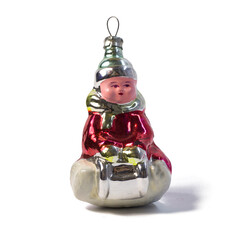 Old soviet decoration for the Christmas tree, glass toy little girl close up on white background