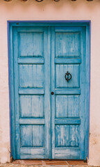 Typical blue door of Altea, the Mediterranean town that drives artists crazy