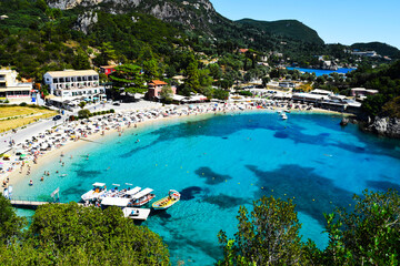 A picturesque beach in the village of Paleokastritsa. Selective focus. Corfu, Greece.