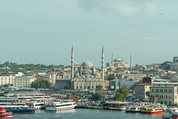 Fototapeta na wymiar Golden horn port area in istanbul next to the new mosque and in the background the cathedral mosque of Santa Sofia
