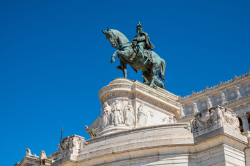 Fototapeta na wymiar Statue of Victor Emmanuel II king of united Italy by Enrico Chiaradia within Altare della Patria monument at Piazza Venezia Square in historic city center of Rome in Italy