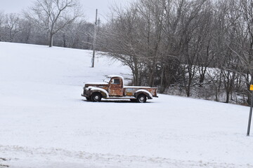 Antique Truck in a Snowy Field