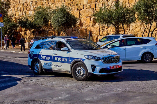 Jerusalem, Israel - November 23, 2021: Police Car On The Street Of Jerusalem On A Sunny Day