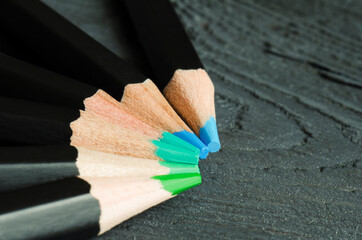 A group of colored pencils, a close-up shot