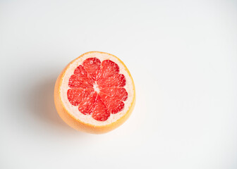 red ripe grapefruit isolated on white background