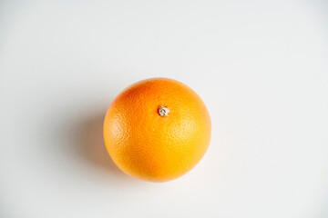 red ripe grapefruit isolated on white background