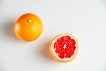 red ripe grapefruit isolated on white background