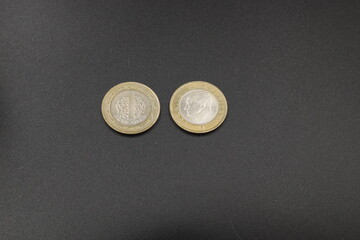 Turkish coin on black background