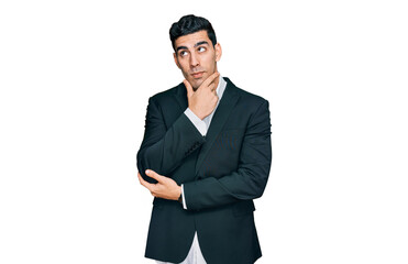 Handsome hispanic man wearing business clothes with hand on chin thinking about question, pensive expression. smiling with thoughtful face. doubt concept.