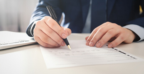 Lawyer working in the office. Singing agreement